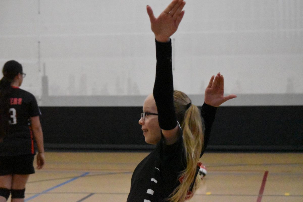 Lila Olson hypes up the bench