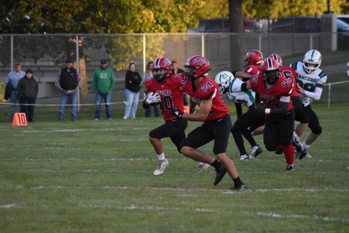 Preston Schoenfelder runs towards the end zone 