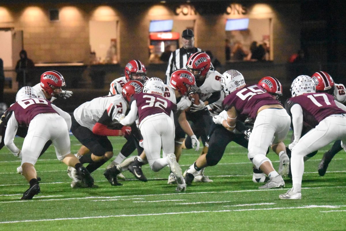 Grady Meyers hands off the ball 