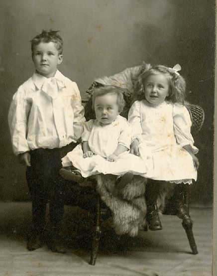 The child in the picture is a boy wearing a dress. Courtesy of Goodhue County Historical Society