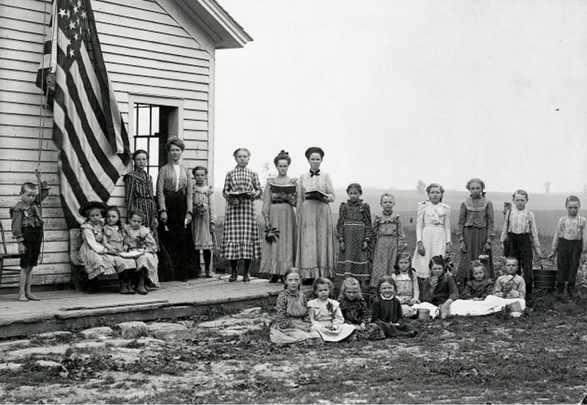 Country school teachers and class dressed in clothing of the 1880's 
  Used with permission of Goodhue County Historical Society