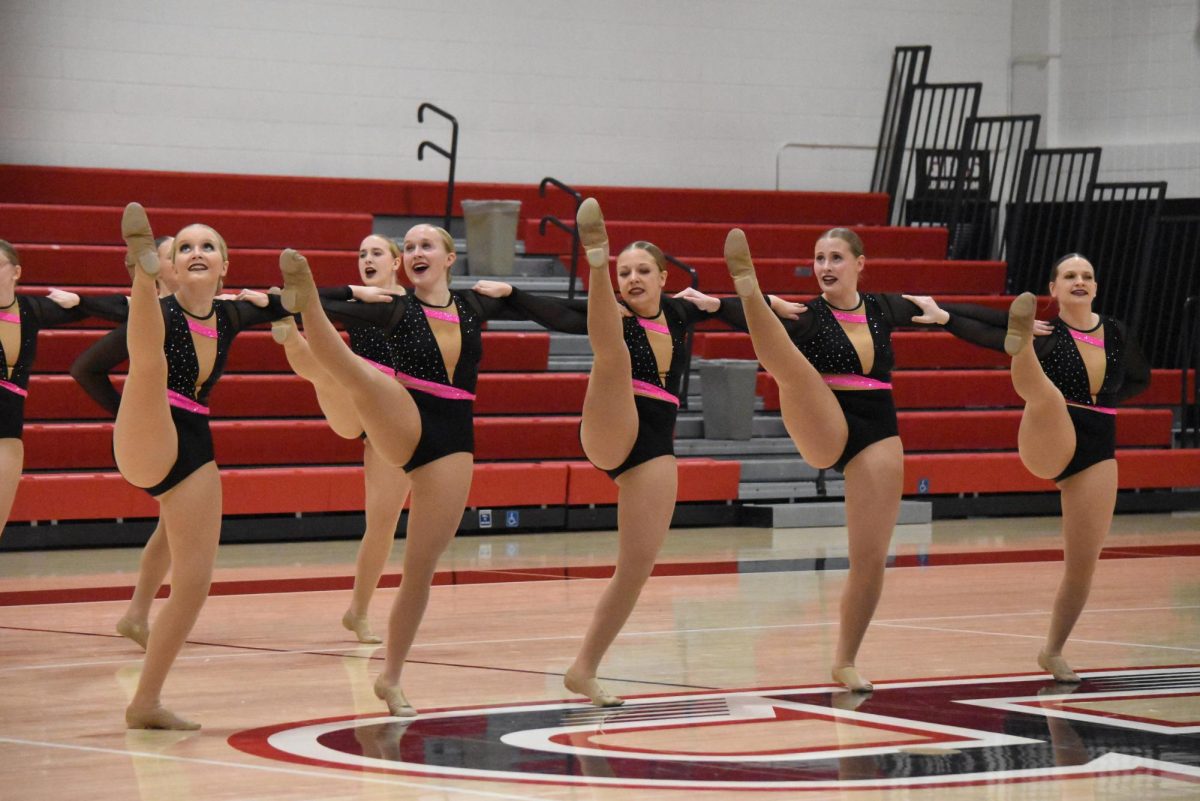 The Bomber Dance Team in a kickline.