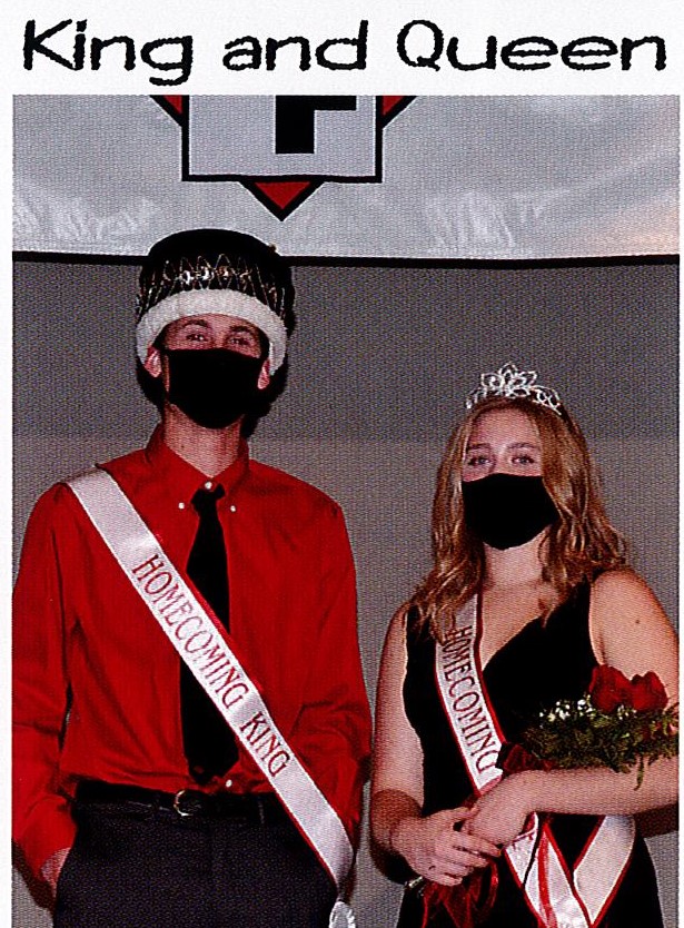 Homecoming royalty tried to put on a good face behind their masks