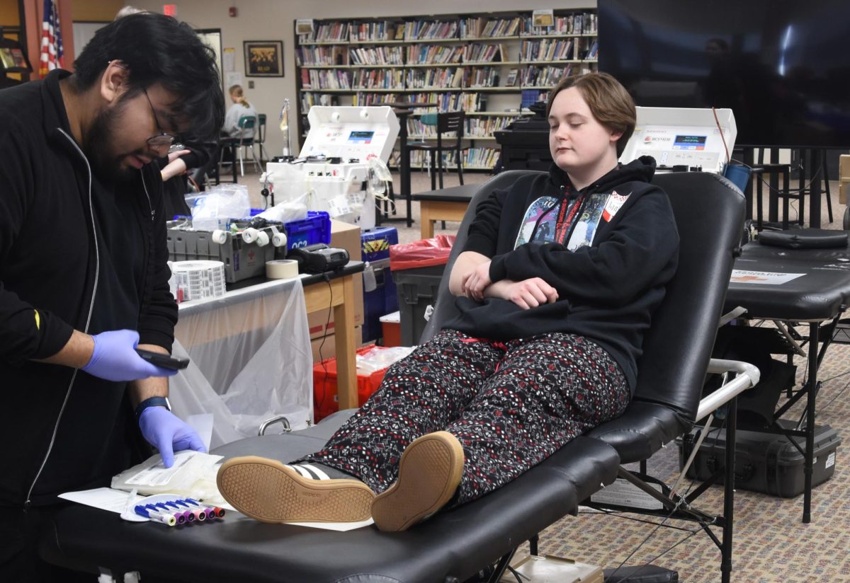 A community member during their blood donation