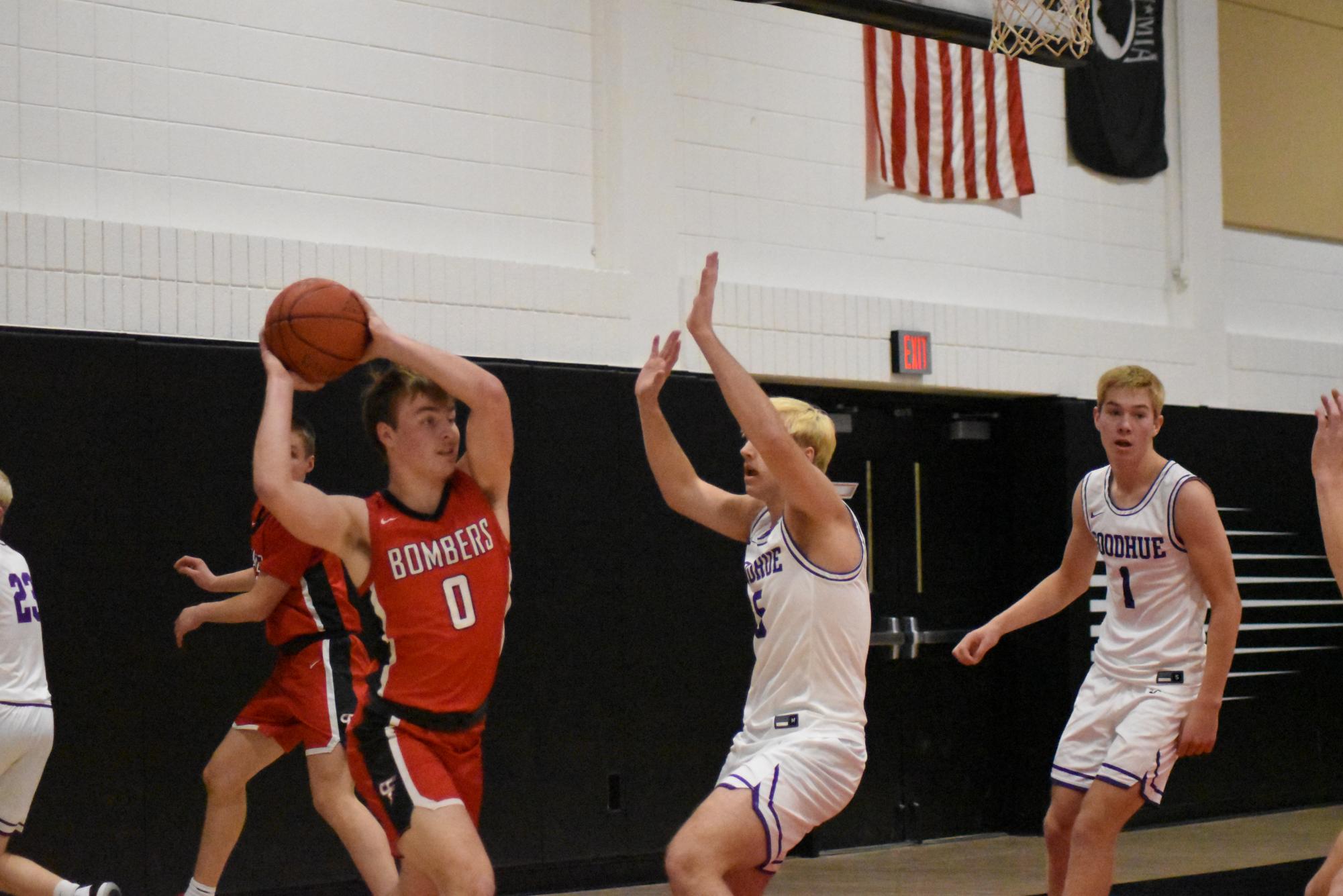 Jack Meyers passes the ball to a teammate for a score