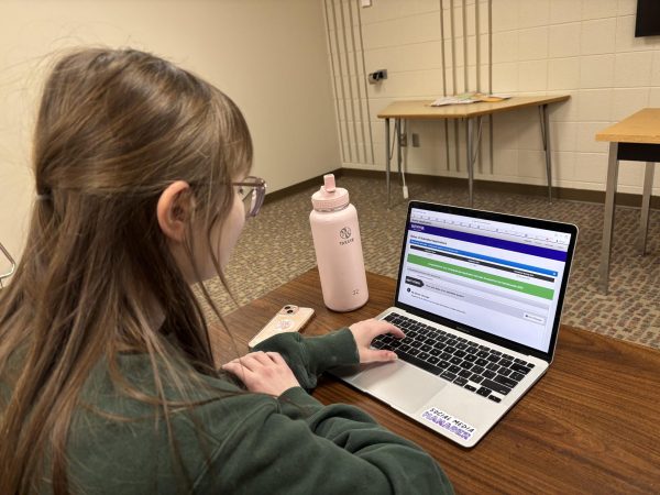 Aubry Conway viewing her acceptance to Winona State University