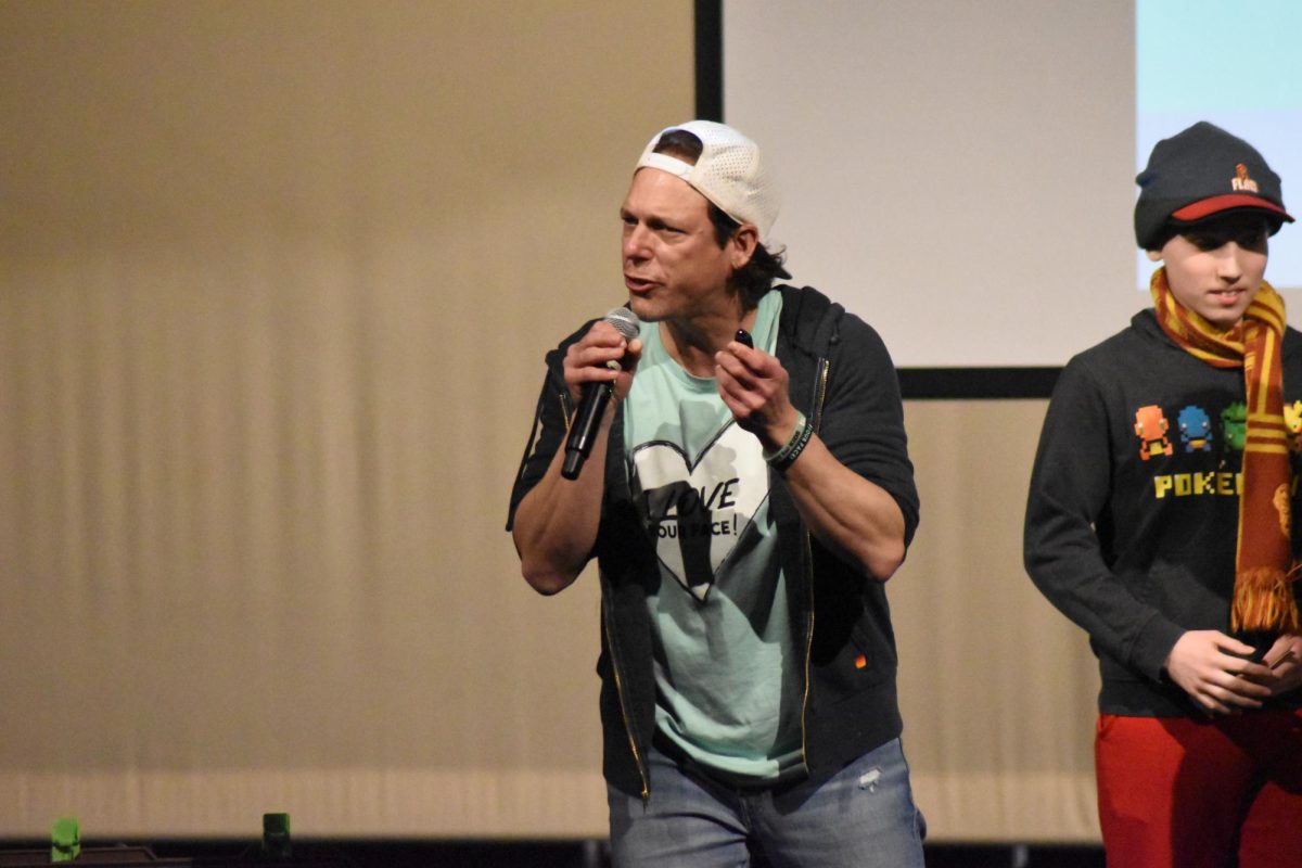 Presenter Joe Beckman adds audience involvement in his presentation.