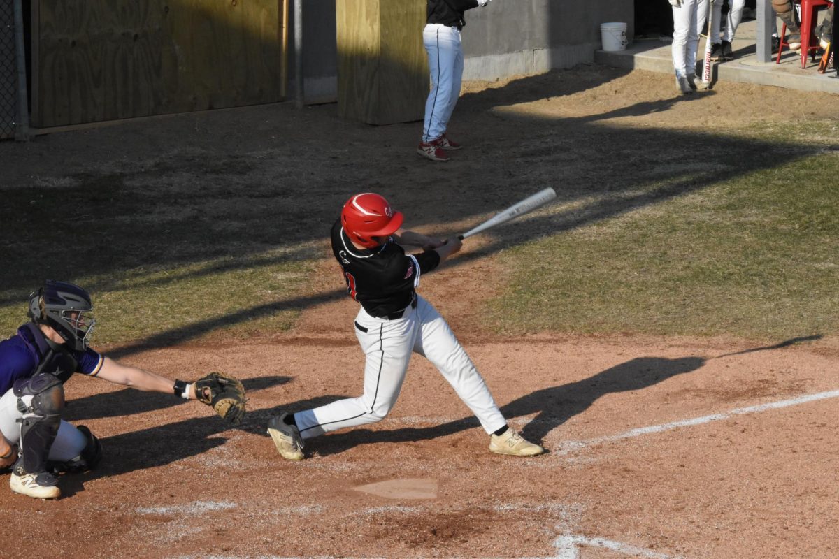 Ethan Deutsch swings the bat 