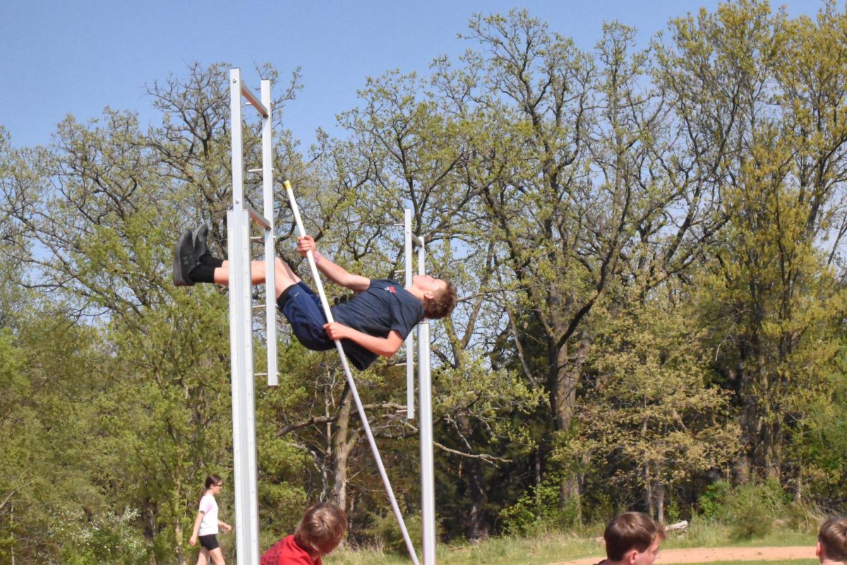 7th grader Louie Otto practices for pole vault.