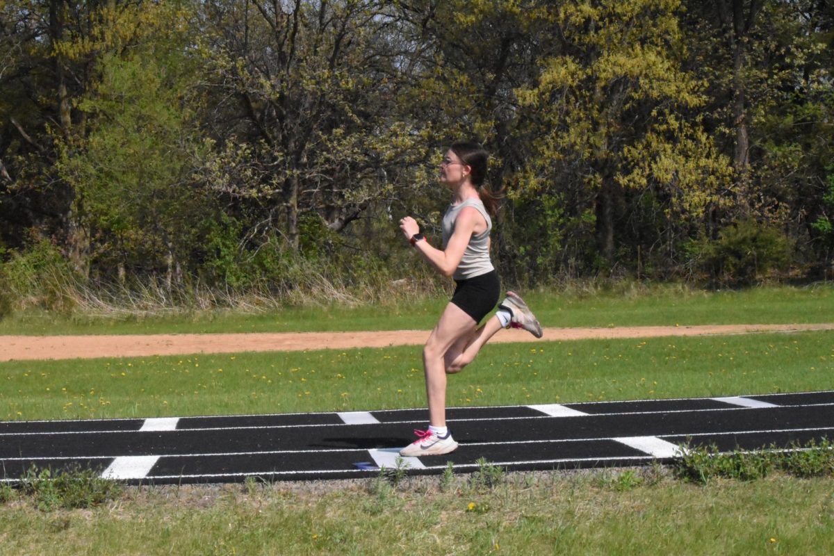 7th grader Kinley Sheller does a run through for triple jump.