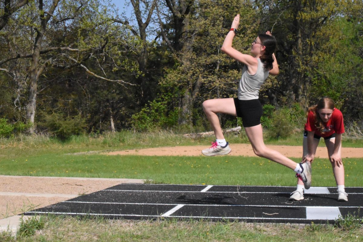 7th grader Kinley Sheller practices getting her toe on the board.
