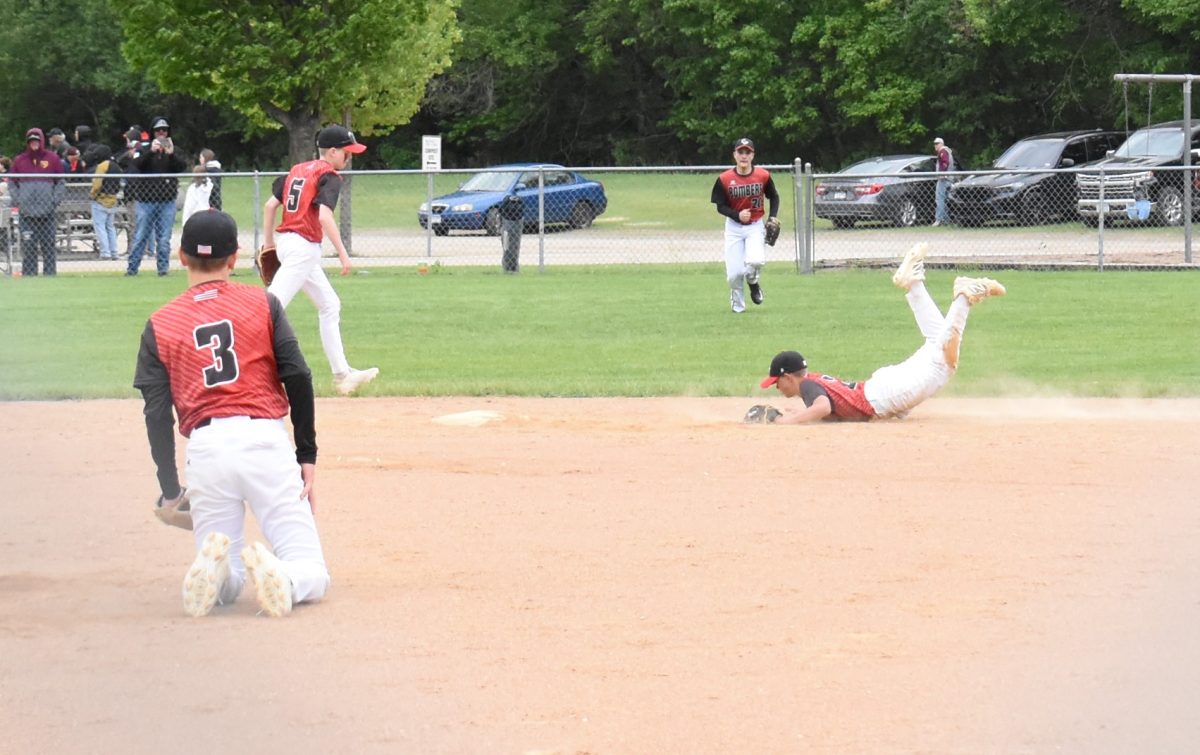 Brady Fox dives for the ball