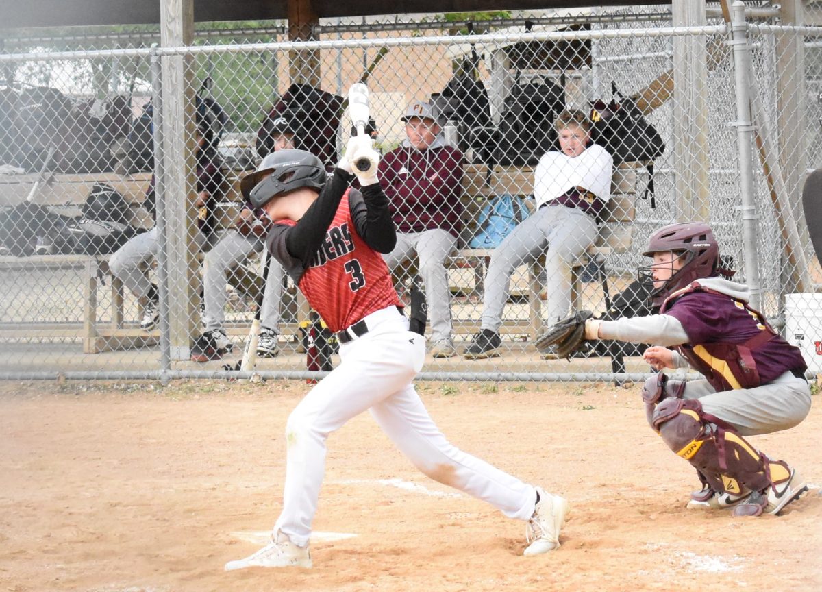 Mayson Vogel hits the ball into the outfield