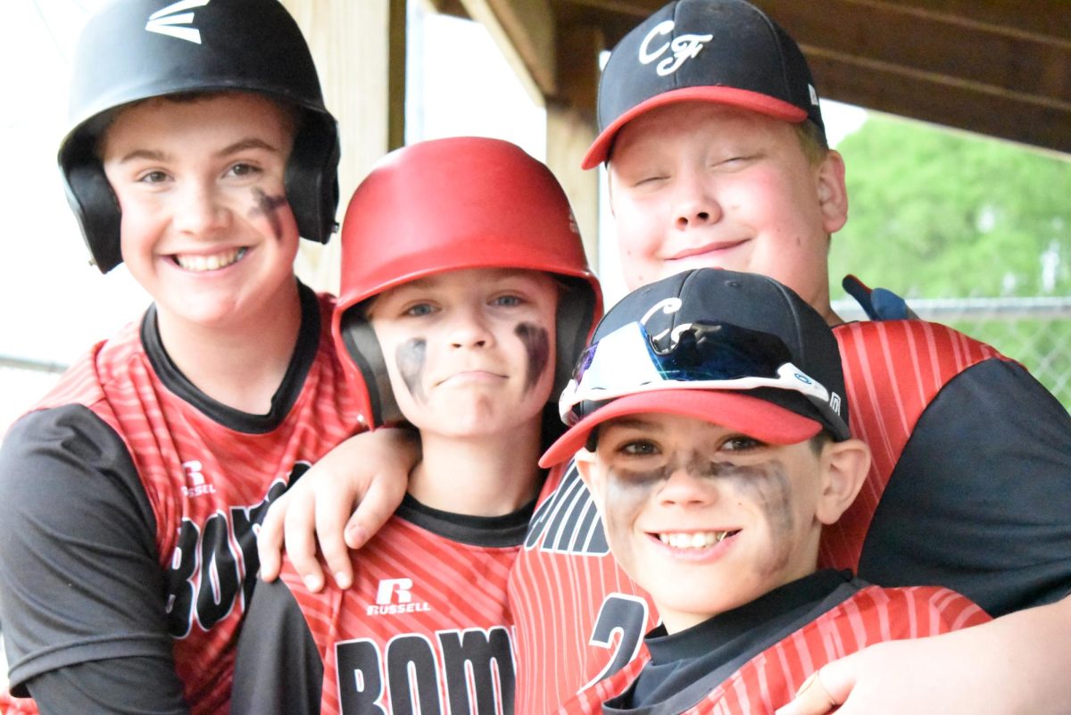 Players gather before the game (L-R, top, Reed Holz, Carter Stay, Mikko Otterness, front, Kason Lindahl)