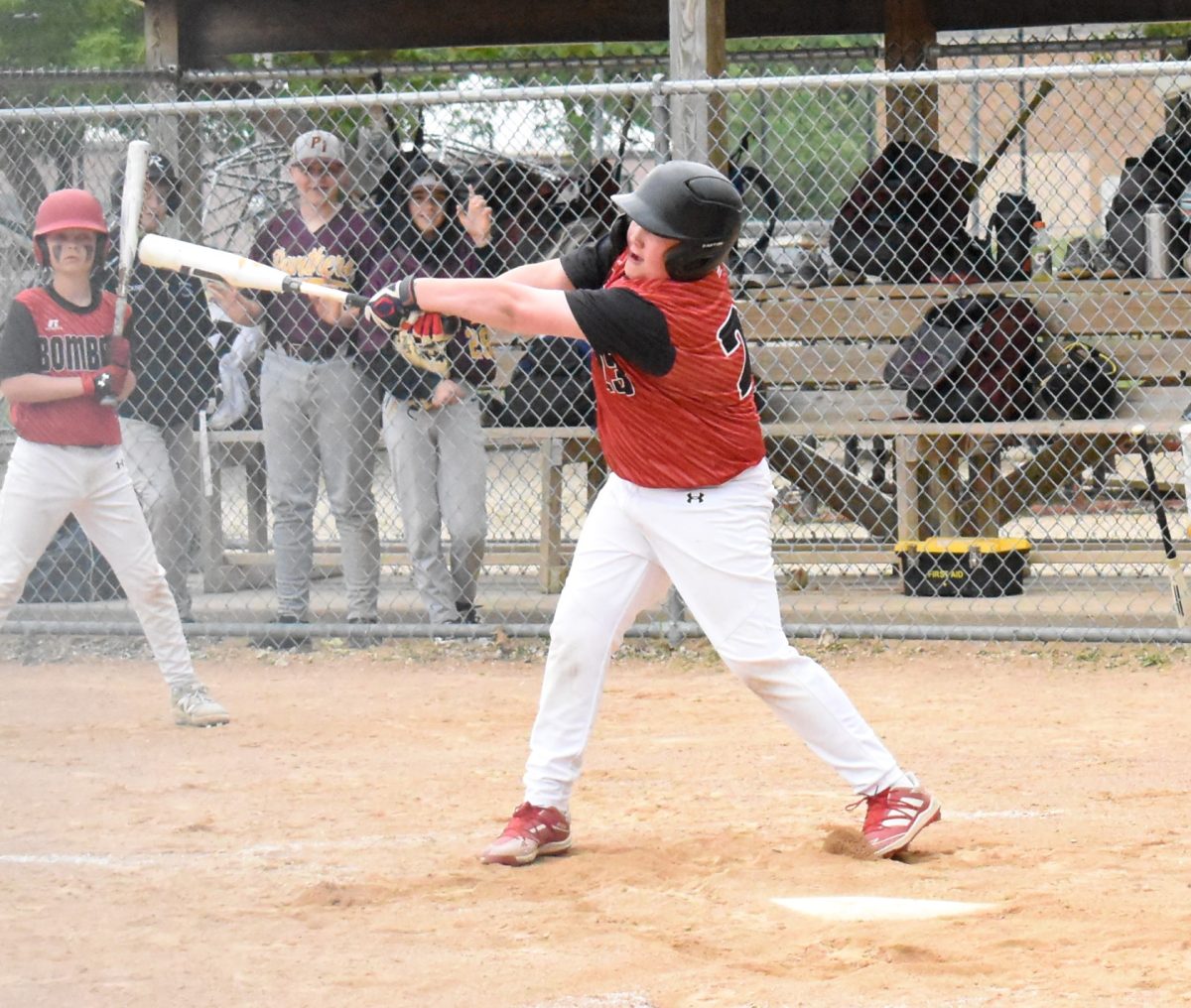 Mikko Otterness takes a strong swing