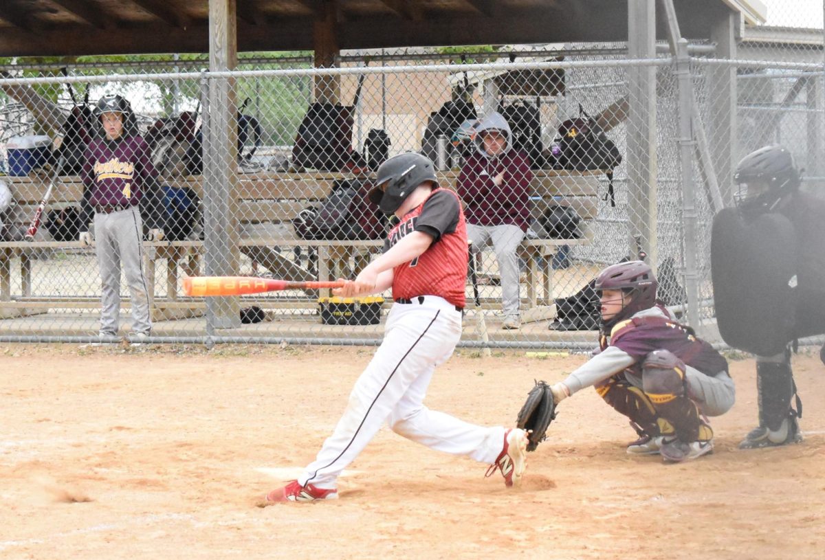 Abe Rassier gets a solid hit