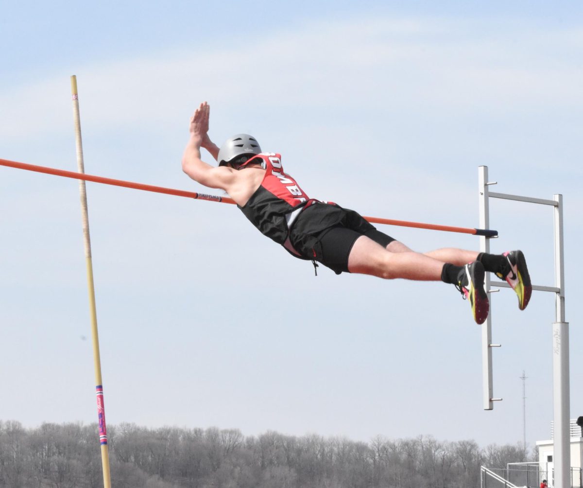 A Cannon Falls pole vaulter easily clears the bar at the sub-section meet