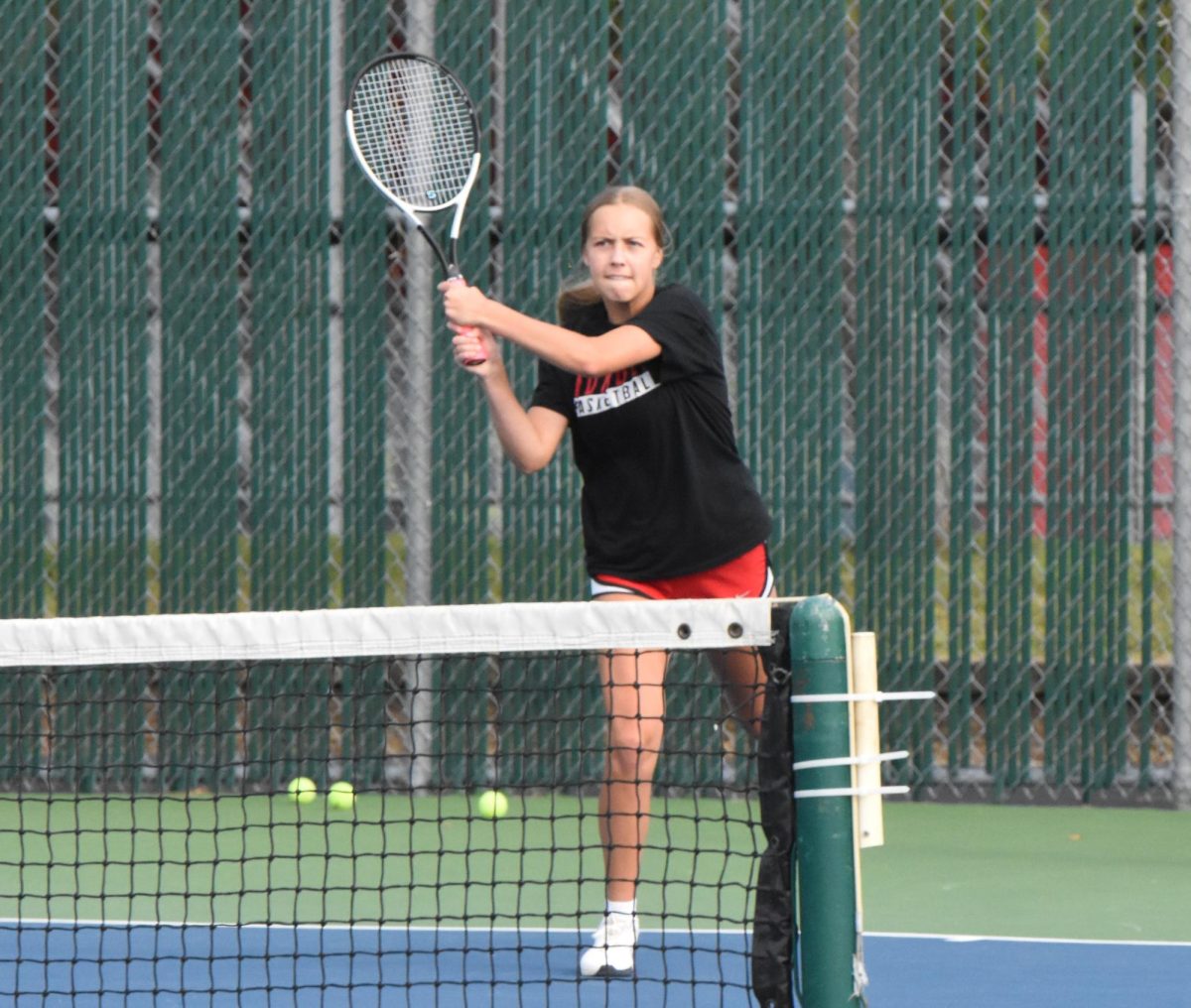 Livia Tennessen finishes a backhand hit. 