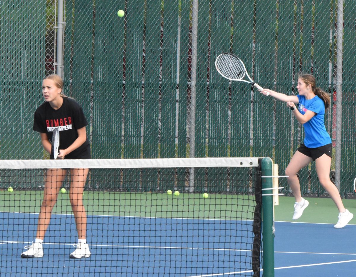 Livia Tennessen and Miranda Mandelkow play a doubles match together in practice.