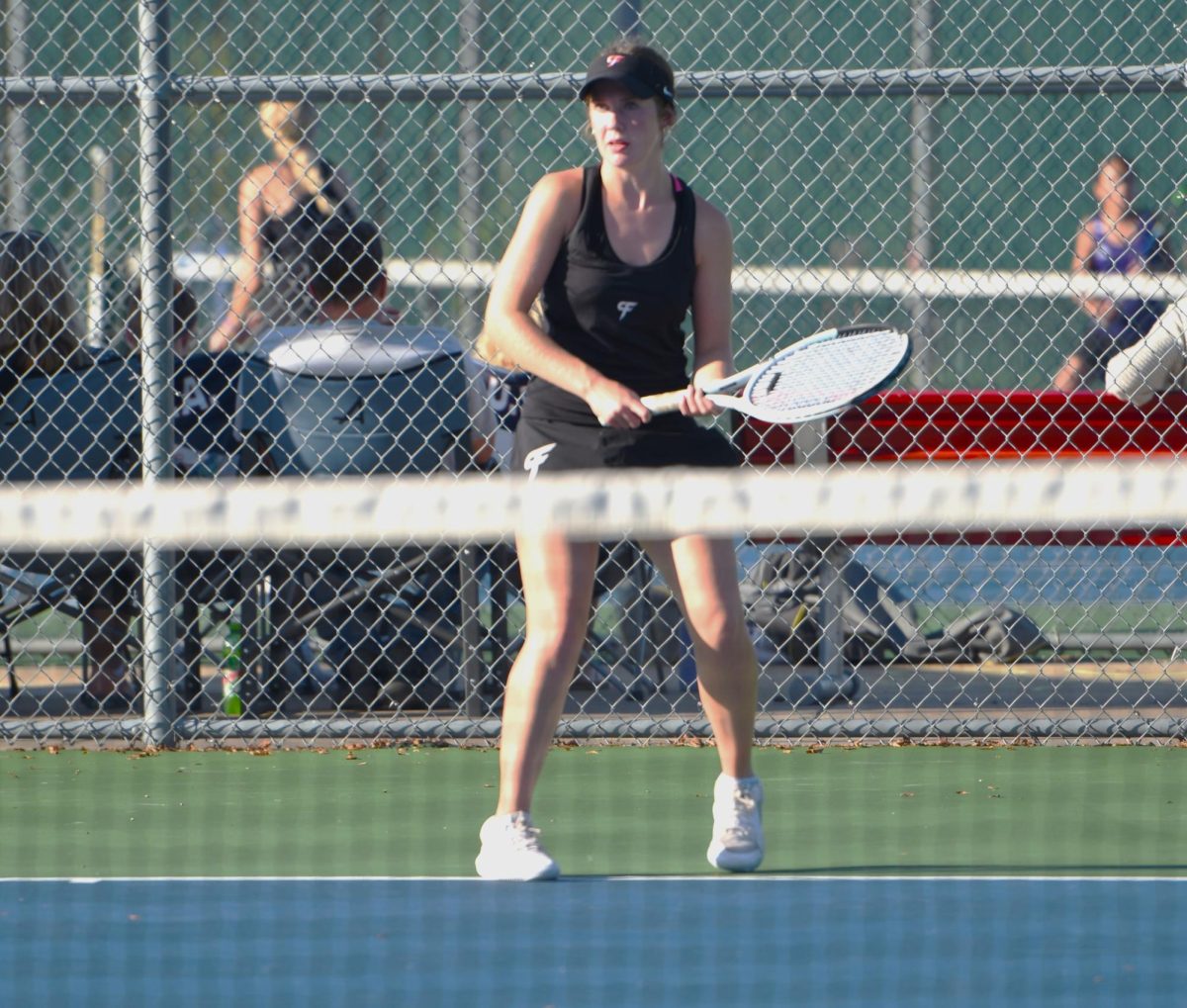 Miranda Mandelkow waits for her opponent to return her hit.
