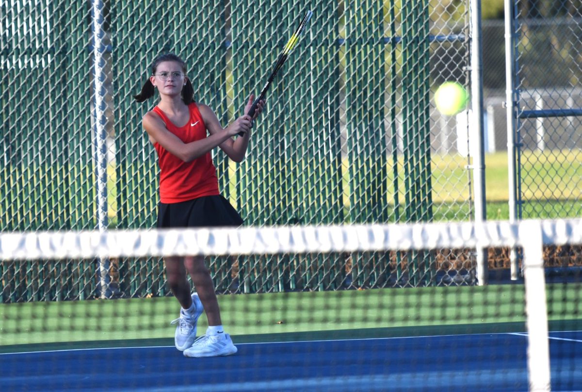 Kinley Sheller follows through on her swing