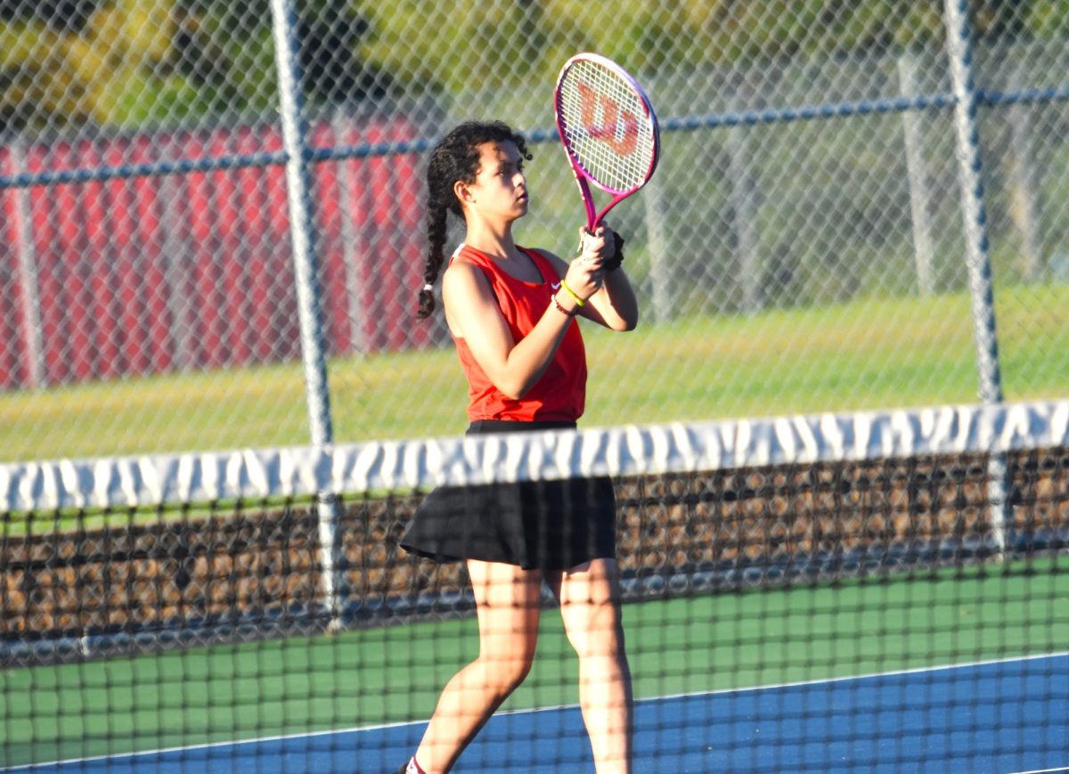 Grace Otterness waits for a volley.