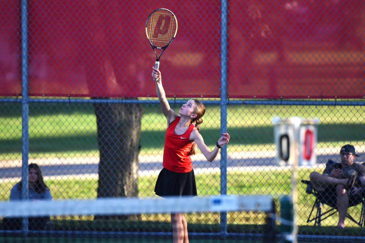 Lola WInchell reaches for her toss.
