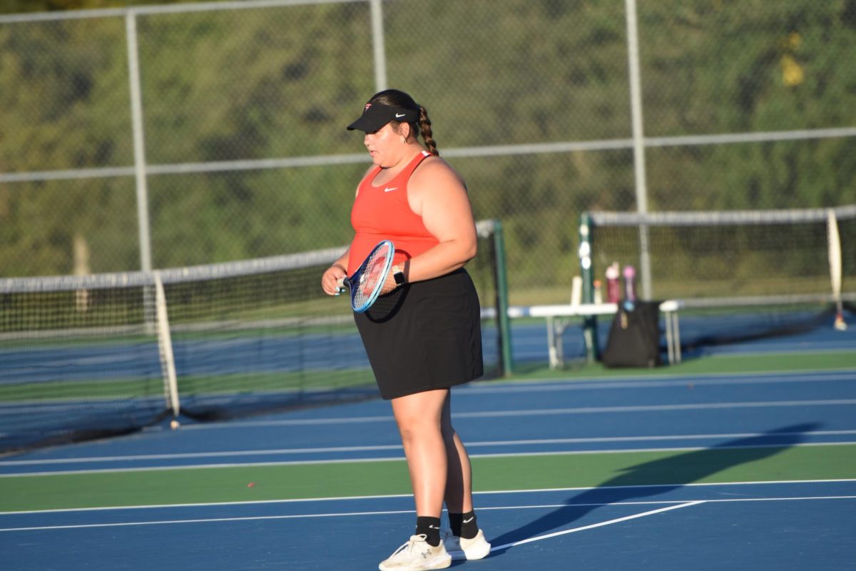 Kallie Otto waits for her opponent's serve