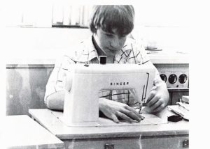 Home economics student of the 1980s  learning how to sew.