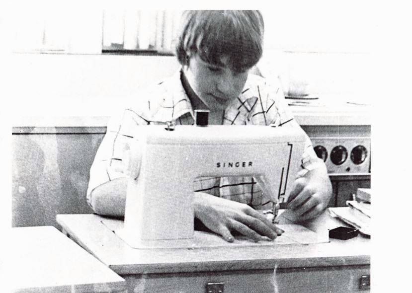 Home economics student of the 1980s  learning how to sew.