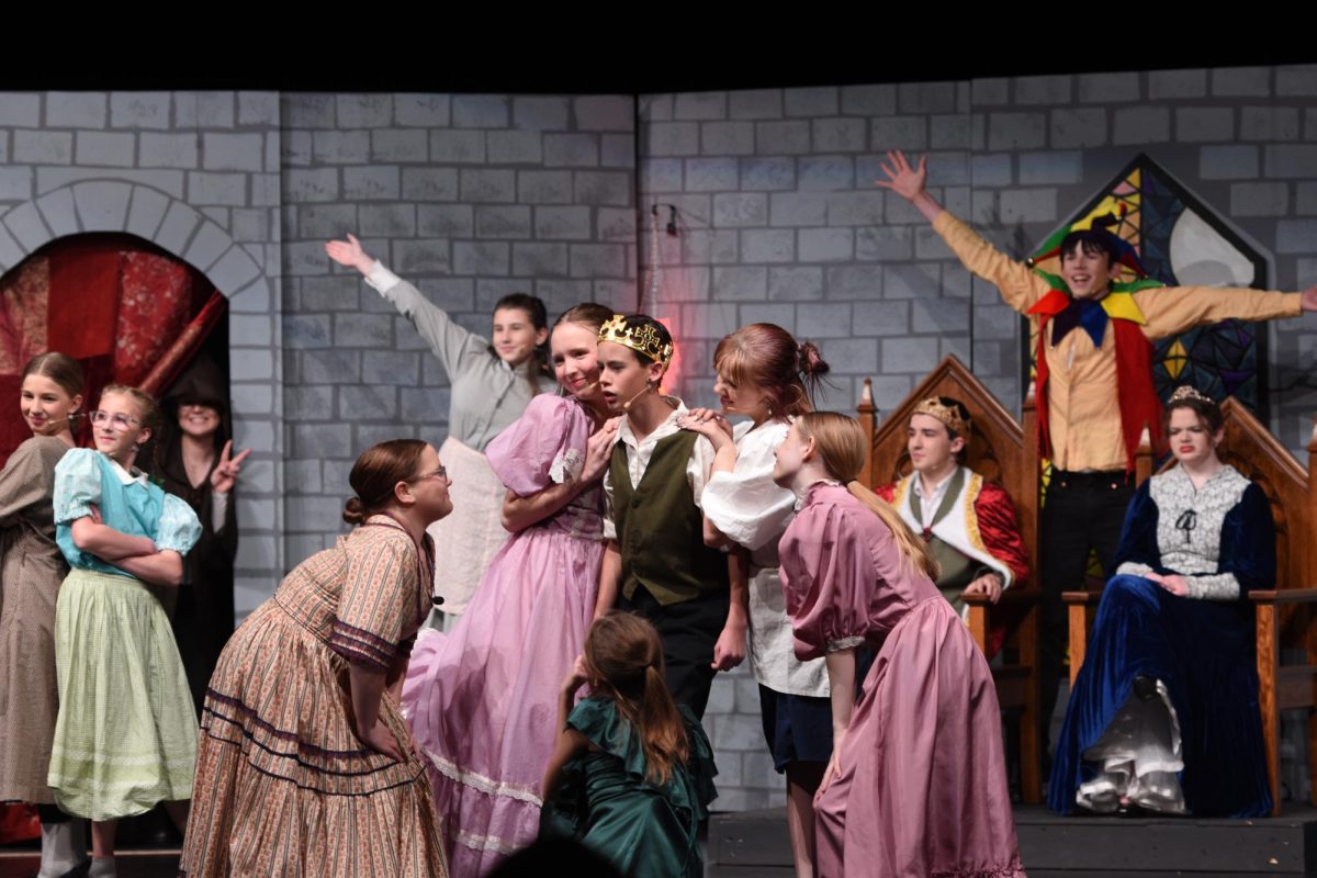 The cast during a song performance on Friday, November 21.