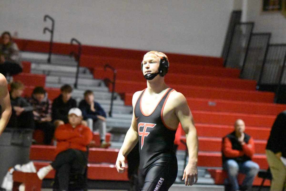 Wrestler Griffin Peterson at a wrestling meet.
