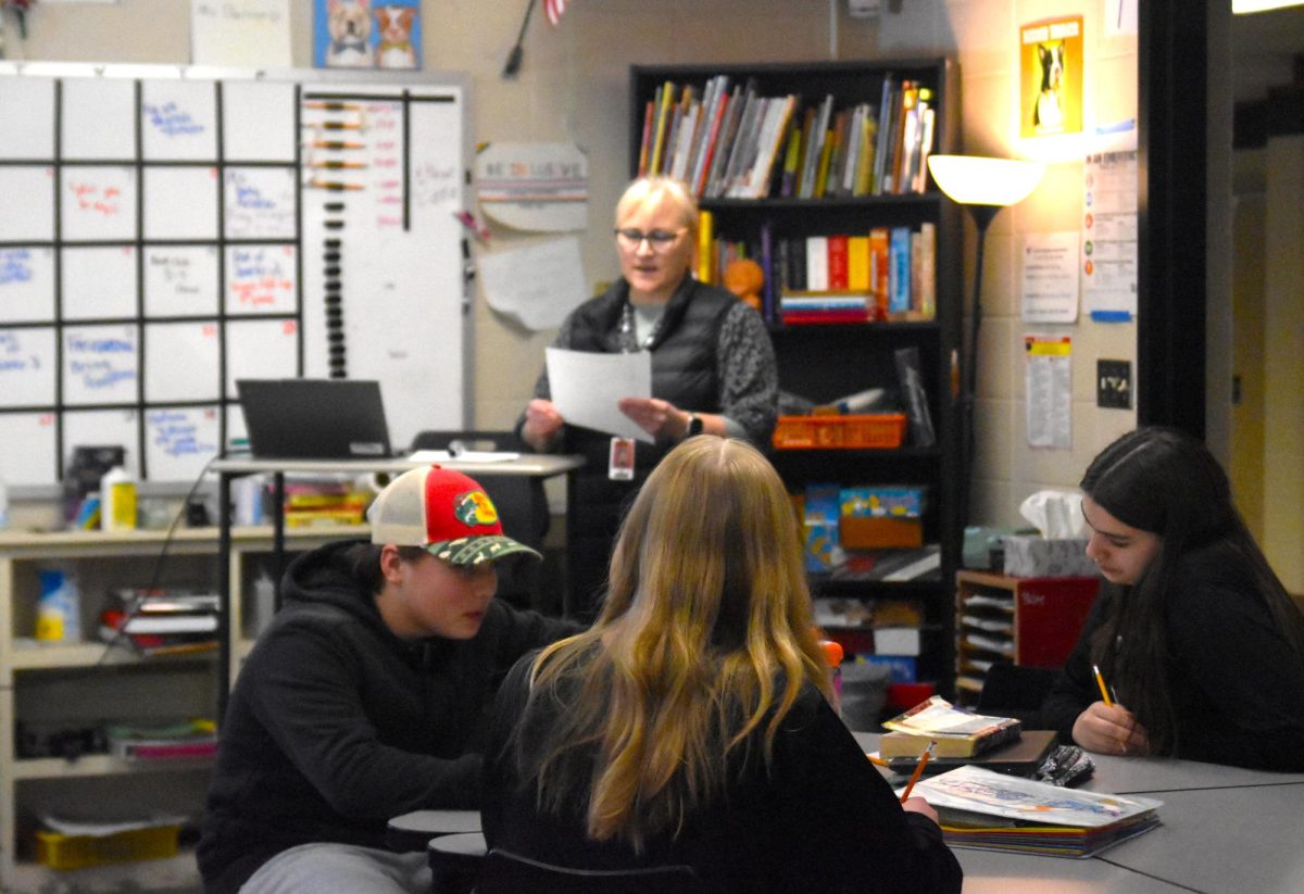 Guidance Counselor Kirsten Hoffman explains to 8th graders what their options are as they prepare to enter high school