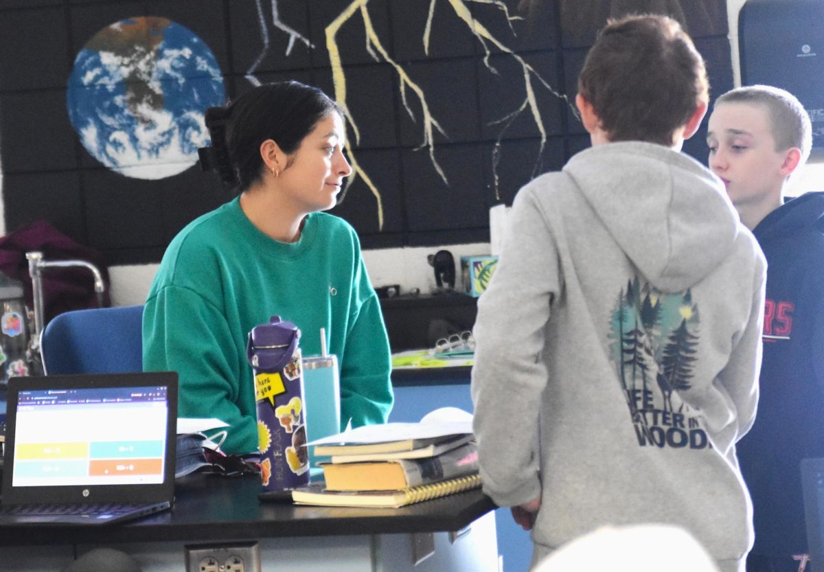 New MS teacher Lauren Emerson works with 7th grade math class