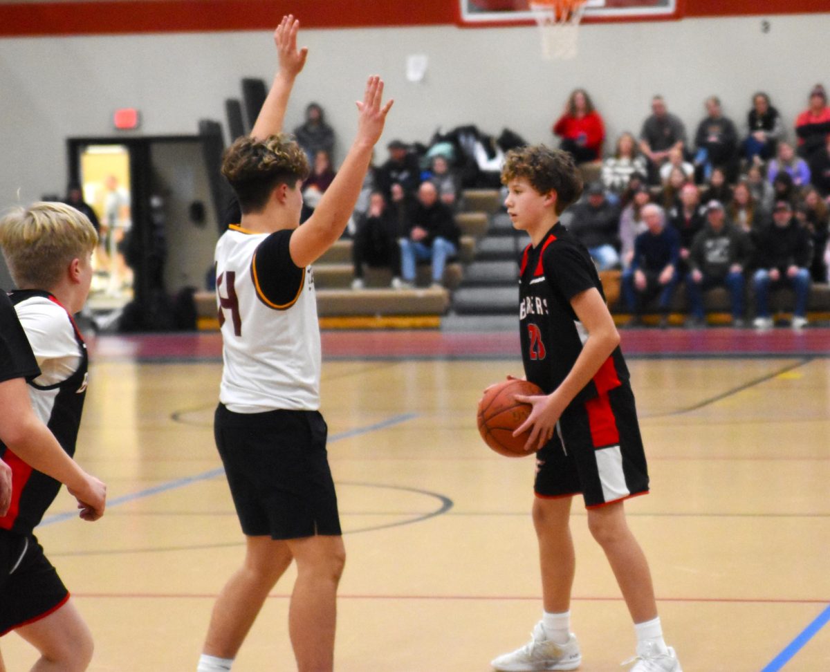 Ethan Johnson looks for an open teammate.