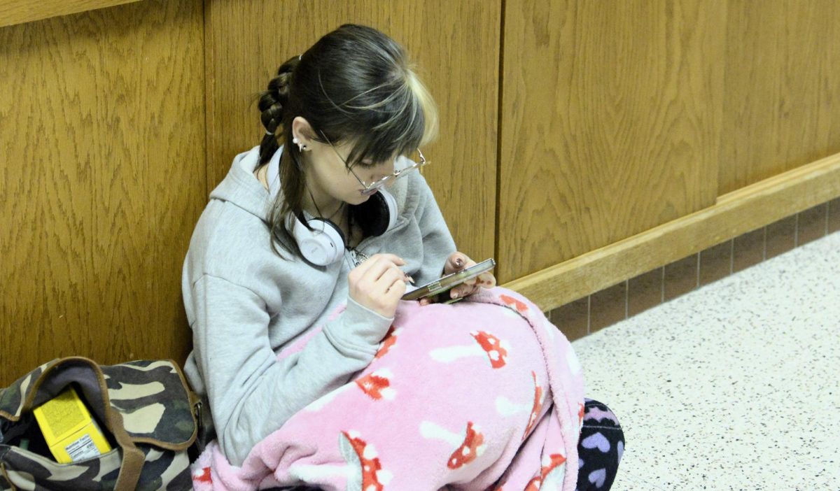 Hades Kammerude Relaxes before the bus ride to the Rochester tournament