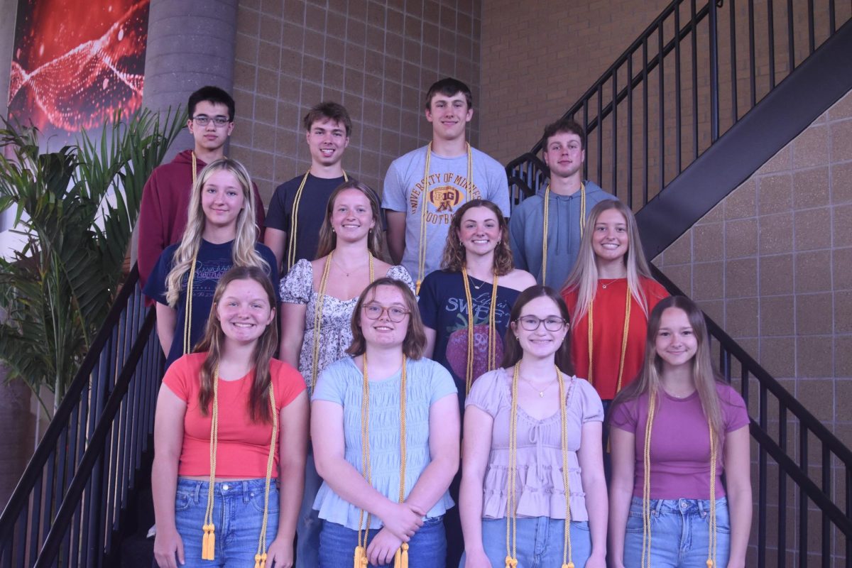 The board scholars got together to take a group photo in the atrium at Cannon Falls High School