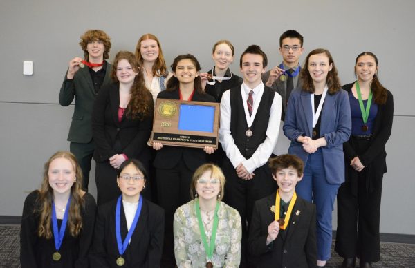 Speech team poses for taem picture after winning the section 1A tournament