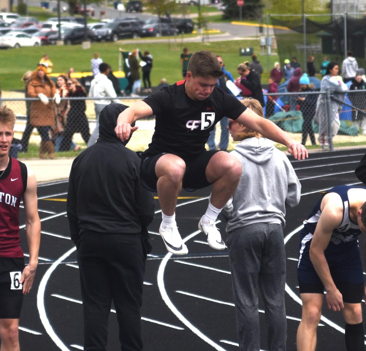 Will Montgomery warms up seconds before the boys' 100-meter dash at the True Team meet on May 5.