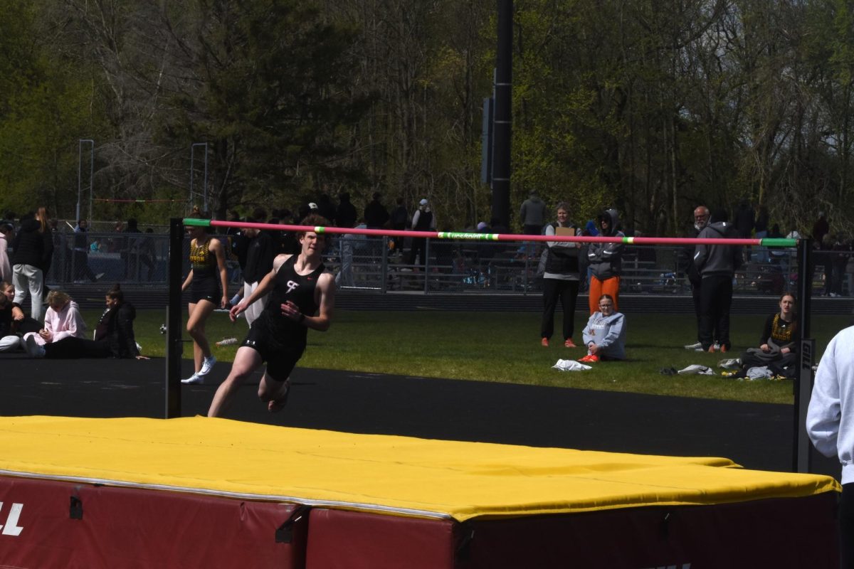 Caelan Heinlein performs his runup during the boys' high jump at the HVL conference meet on May 9.