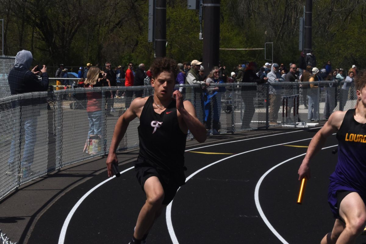 Dylan Menge during a relay race at the HVL conference meet on May 9.