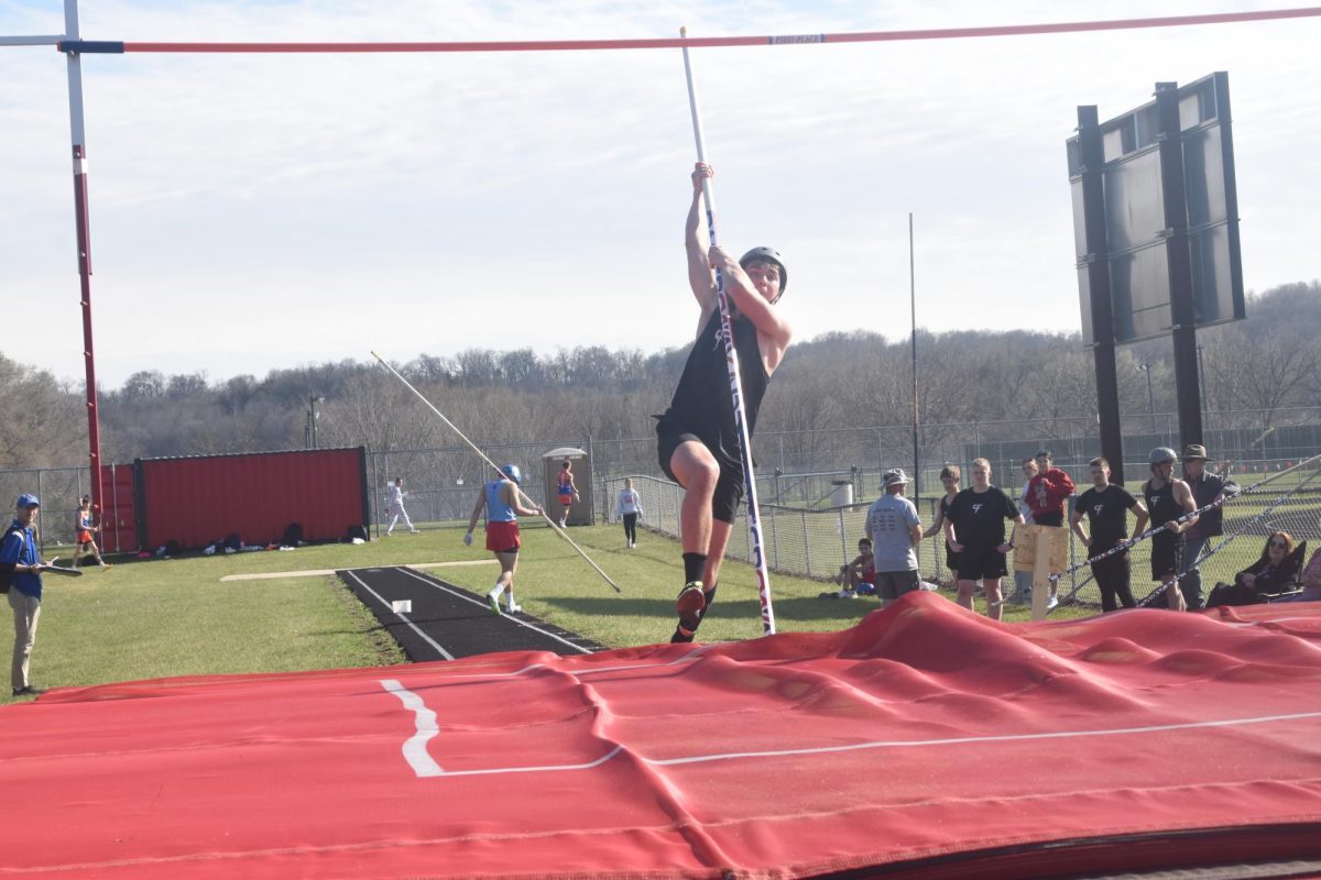 Senior Graham Bray attempts a pole vault at a Cannon Falls invitational track meet.